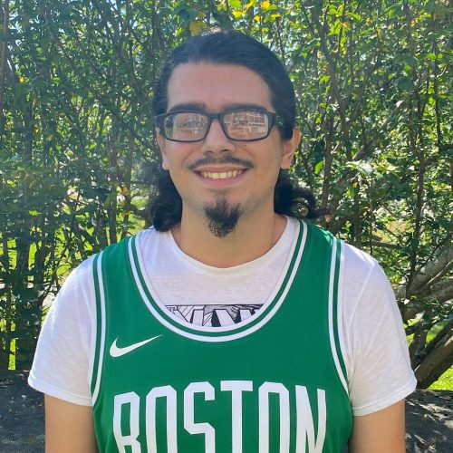 Ciao smiles for the camera and proudly wears his Boston Celtics jersey.